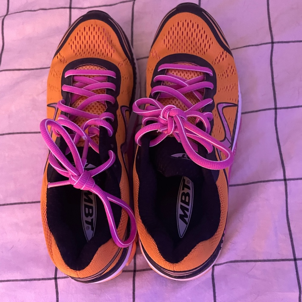 Pink and orange MPT tennis shoes